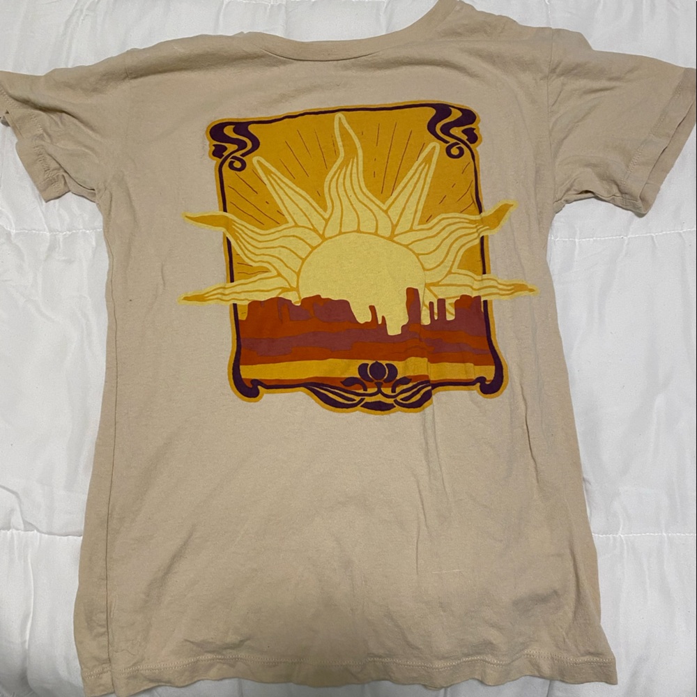 Small tan shirt